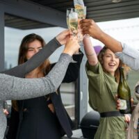 Bridesmaids having a toast.